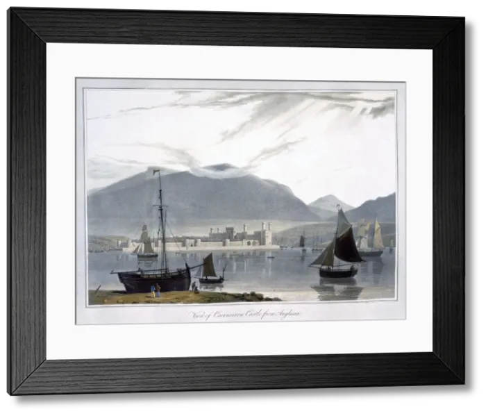 Framed Print : View of Caernarvon Castle from Anglesea, Wales, 1814. Artist: William Daniell Framed Print : View of Caernarvon Castle from Anglesea, Wales, 1814. Artist: William Daniell