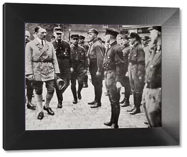 Hitler inspecting a group of SA Members during World War II, Germany, 1939-1945. Artist