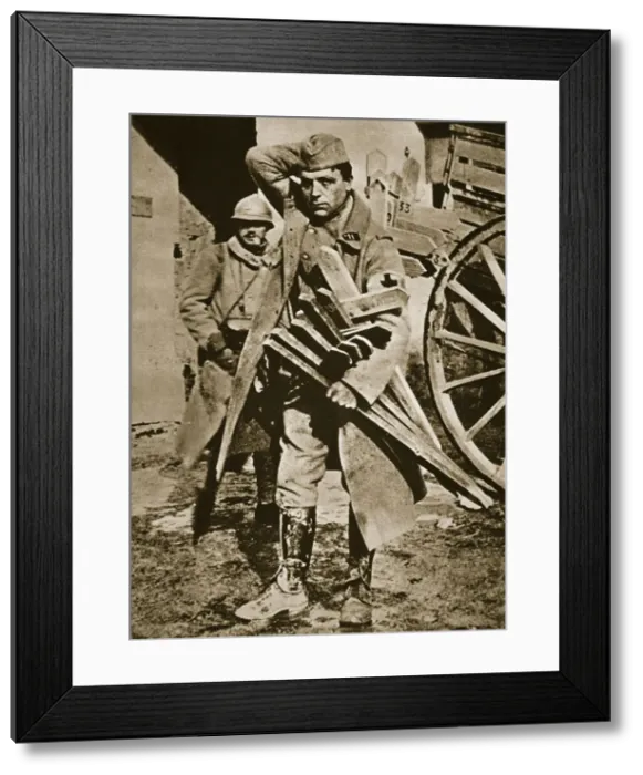 Framed Print : French soldier with wooden crosses to be placed on temporary graves, World War I, c1914-c1918 Framed Print : French soldier with wooden crosses to be placed on temporary graves, World War I, c1914-c1918