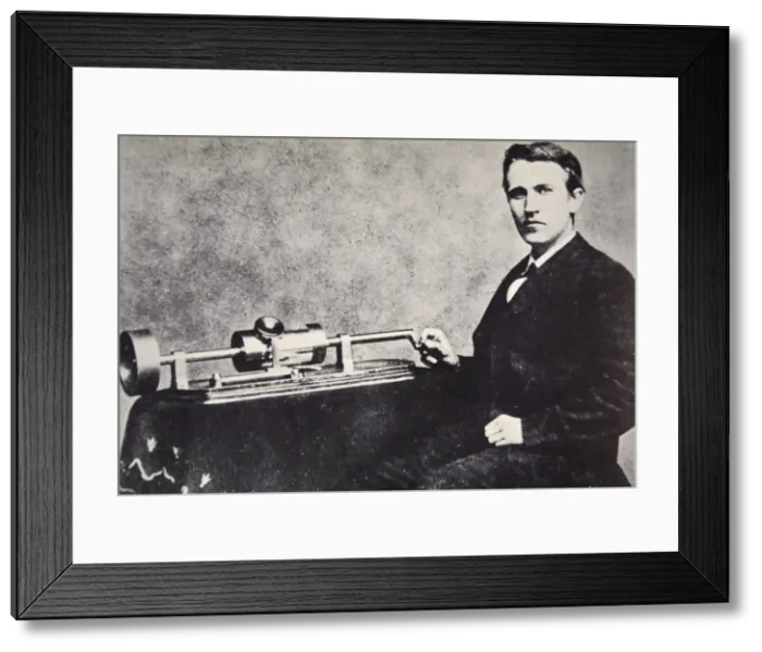 Framed Print : Thomas Alva Edison sitting beside his invention, the phonograph, 1878 Framed Print : Thomas Alva Edison sitting beside his invention, the phonograph, 1878