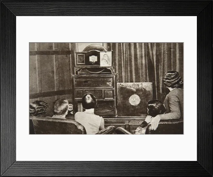 Framed Print : People watching an early television transmission, c1920s Framed Print : People watching an early television transmission, c1920s