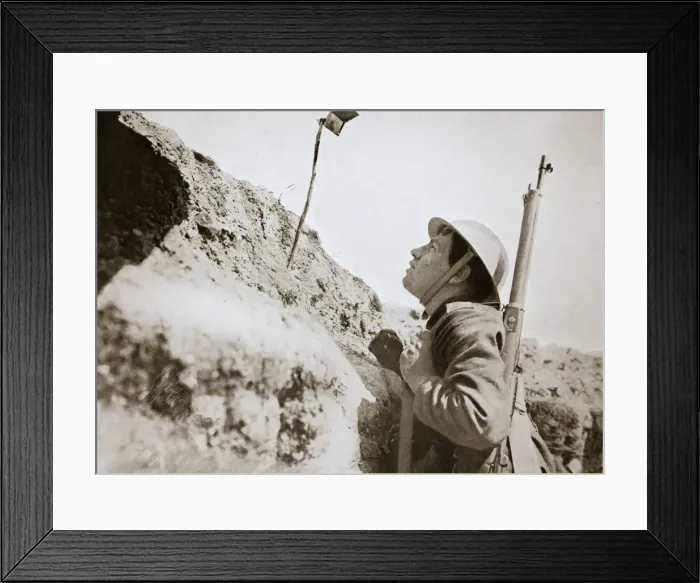 Framed Print : A sentry in the trenches looking through an improvised persicope, France, World War I, 1916 Framed Print : A sentry in the trenches looking through an improvised persicope, France, World War I, 1916