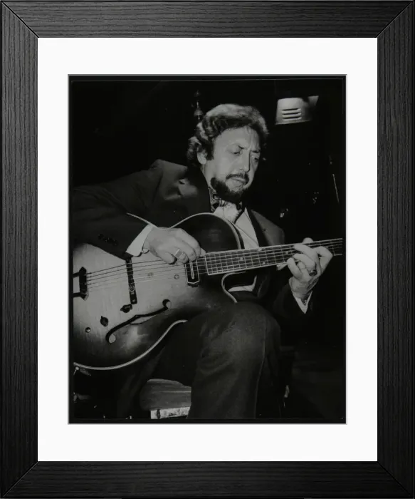 Framed Print : American guitarist Barney Kessel playing at the Middlesex and Herts Country Club, London, 1982 Framed Print : American guitarist Barney Kessel playing at the Middlesex and Herts Country Club, London, 1982