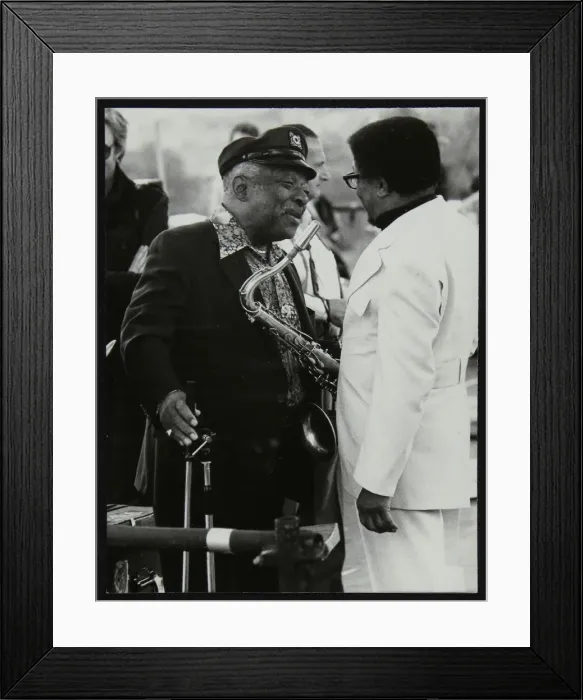 Framed Print : Count Basie chatting with Illinois Jacquet at the Capital Radio Jazz Festival, London, July 1979 Framed Print : Count Basie chatting with Illinois Jacquet at the Capital Radio Jazz Festival, London, July 1979
