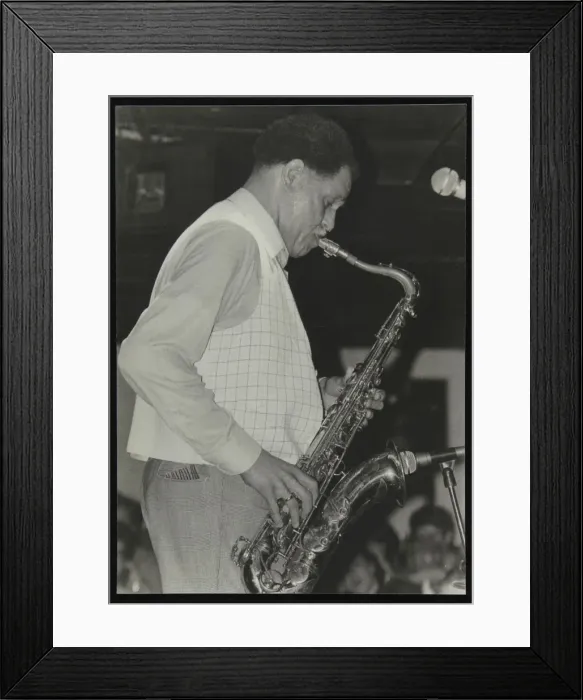 Framed Print : Saxophonist Dexter Gordon playing at Ronnie Scotts Jazz Club, London, 1980. Artist Framed Print : Saxophonist Dexter Gordon playing at Ronnie Scotts Jazz Club, London, 1980. Artist