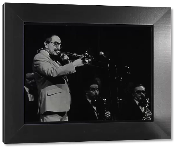 Trombonist Don Lusher playing with the Ted Heath Orchestra. Artist: Denis Williams