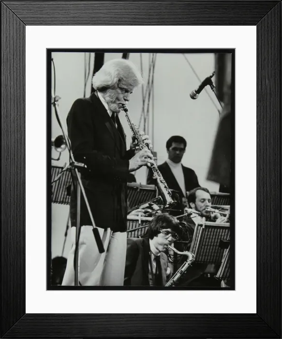 Framed Print : Gerry Mulligan playing at the Capital Radio Jazz Festival, Knebworth, Hertfordshire, July 1982 Framed Print : Gerry Mulligan playing at the Capital Radio Jazz Festival, Knebworth, Hertfordshire, July 1982