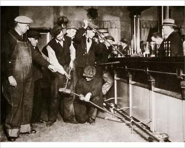 A bar in Camden, New Jersey, being forcibly dismantled by dry agents, USA, 1920s