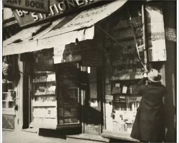 Opening for business, stationery shop in Manhattan, New York, USA, 1930. Artist