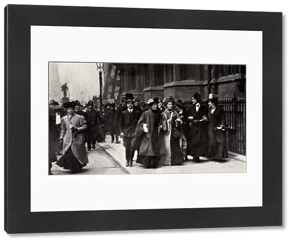 Emmeline Pankhurst, British suffragette leader, carrying a petition, London, 13 February 1908