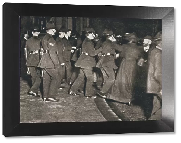 The Womens Freedom League attempting to enter the House of Commons, London, 1908