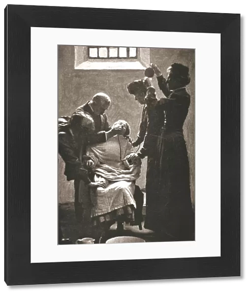Suffragette being force fed with the nasal tube in Holloway Prison, London, 1909