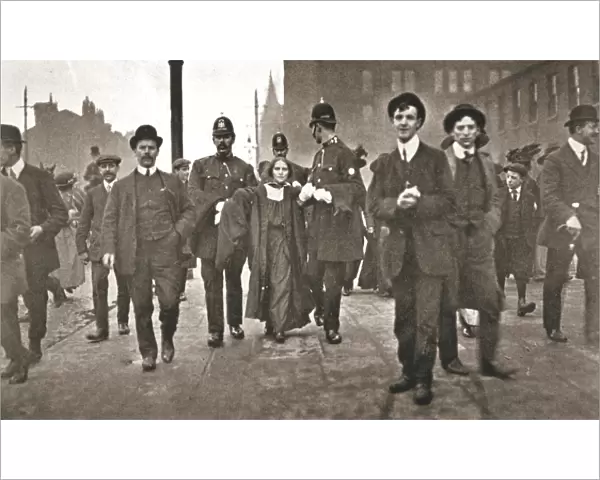 Arrest of Dora Marsden, British suffragette, outside the Victoria University of Manchester, 1909