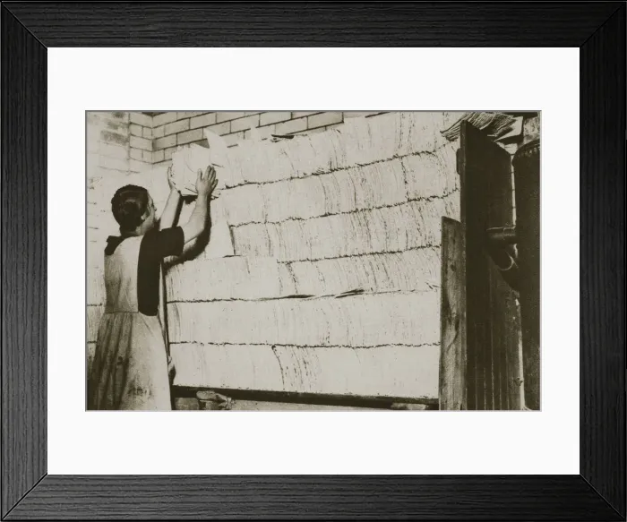 Framed Print : Stacking unleavened bread for the Passover in a Jewish bakery, 20th century. Artist Framed Print : Stacking unleavened bread for the Passover in a Jewish bakery, 20th century. Artist