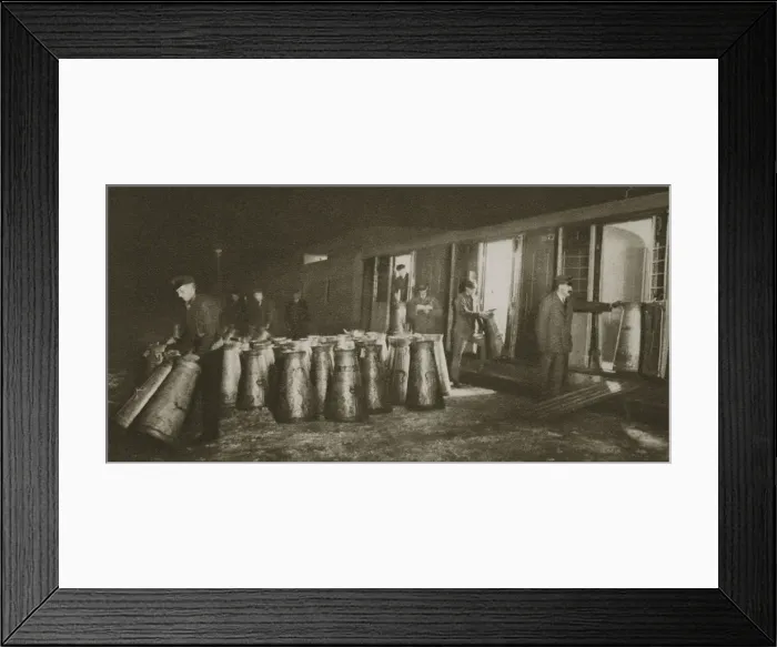Framed Print : Unloading a milk train, London, 20th century Framed Print : Unloading a milk train, London, 20th century