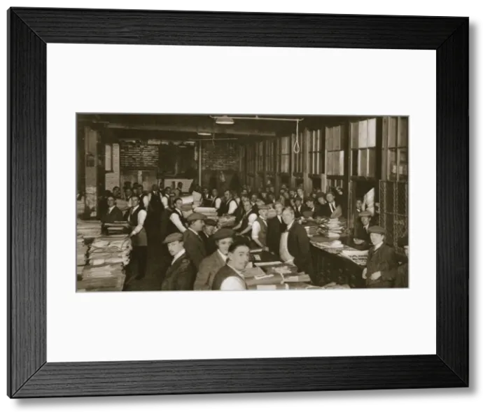 Framed Print : Newsvendors gather to pick up the next days newspapers to sell, Carmelite House, 20th century Framed Print : Newsvendors gather to pick up the next days newspapers to sell, Carmelite House, 20th century