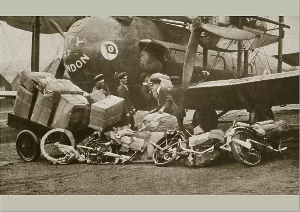 Loading Vickers-Vimy aircraft City of London with motorbike frames for Cologne