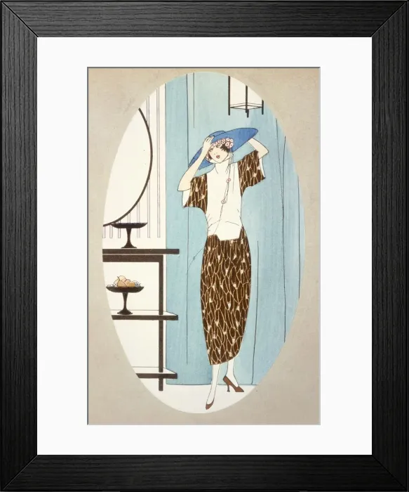 Framed Print : Lady Trying on a Hat, from Art Gout Beaute, 1921 (pochoir print) Framed Print : Lady Trying on a Hat, from Art Gout Beaute, 1921 (pochoir print)