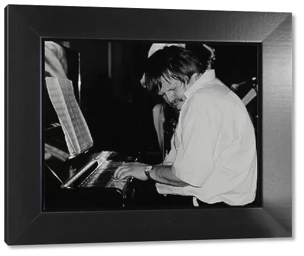 Geoff Eales playing the piano at The Fairway, Welwyn Garden City, Hertfordshire, 11 March 2001