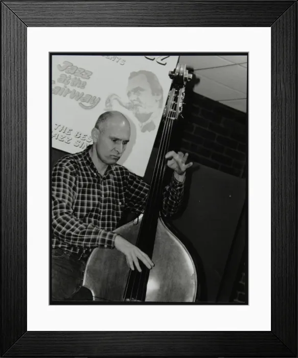 Framed Print : Bassist Simon Woolf playing at The Fairway, Welwyn Garden City, Hertfordshire, 2002