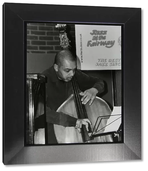 Double bassist Gary Crosby playing at The Fairway, Welwyn Garden City, Hertfordshire, 2004