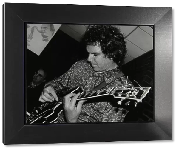Guitarist John Etheridge playing at The Fairway, Welwyn Garden City, Hertfordshire, 9 November 2003