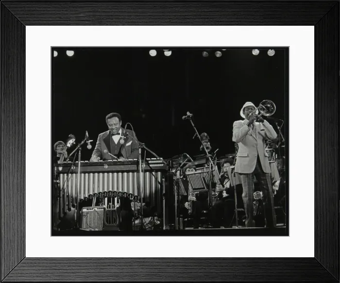 Framed Print : The Lionel Hampton Orchestra on stage at Knebworth, Hertfordshire, July 1982. Artist Framed Print : The Lionel Hampton Orchestra on stage at Knebworth, Hertfordshire, July 1982. Artist