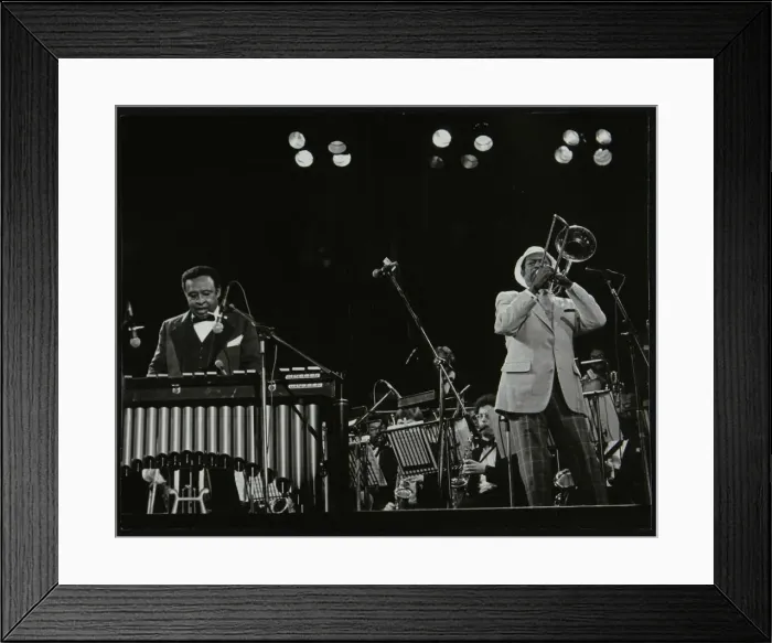 Framed Print : Lionel Hampton (vibraphone) and Al Grey (trombone) on stage at Knebworth, Hertfordshire, July 1982 Framed Print : Lionel Hampton (vibraphone) and Al Grey (trombone) on stage at Knebworth, Hertfordshire, July 1982