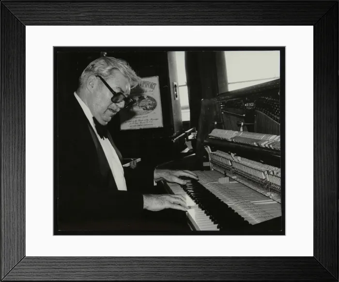 Framed Print : Nat Pierce at the piano, London, 1984. Artist: Denis Williams Framed Print : Nat Pierce at the piano, London, 1984. Artist: Denis Williams