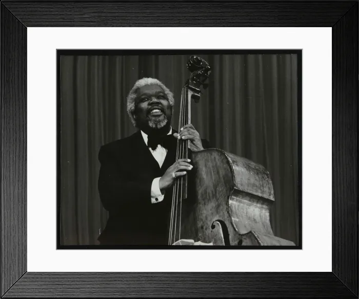 Framed Print : Bassist Arvell Shaw, Stevenage, Hertfordshire, 1984. Artist: Denis Williams Framed Print : Bassist Arvell Shaw, Stevenage, Hertfordshire, 1984. Artist: Denis Williams