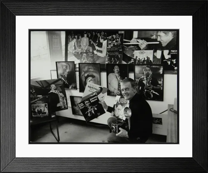 Framed Print : Photographer Denis Williams holding an LP cover Framed Print : Photographer Denis Williams holding an LP cover