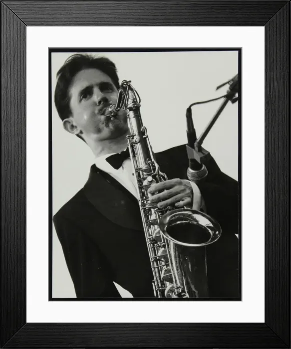 Framed Print : Tenor saxophonist Scott Hamilton playing at Knebworth, Hertfordshire, 1982. Artist Framed Print : Tenor saxophonist Scott Hamilton playing at Knebworth, Hertfordshire, 1982. Artist