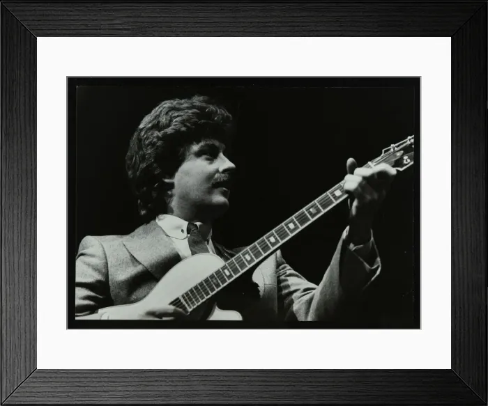 Framed Print : Guitarist Martin Taylor playing at the Forum Theatre, Hatfield, Hertfordshire, 1983 Framed Print : Guitarist Martin Taylor playing at the Forum Theatre, Hatfield, Hertfordshire, 1983