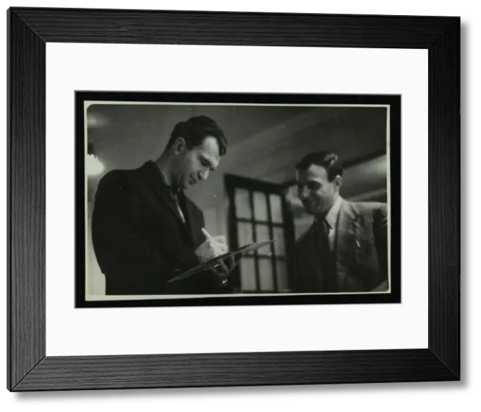 Framed Print : Dave Brubeck signing an autograph, c1950s. Artist: Denis Williams Framed Print : Dave Brubeck signing an autograph, c1950s. Artist: Denis Williams