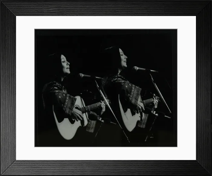 Framed Print : American folk musician Julie Felix performing at the Forum Theatre, Hatfield, Hertfordshire, 1979 Framed Print : American folk musician Julie Felix performing at the Forum Theatre, Hatfield, Hertfordshire, 1979