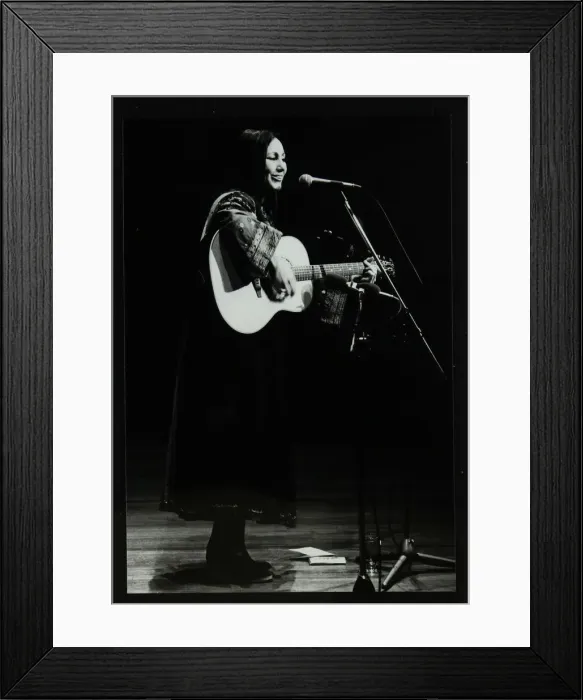 Framed Print : American folk musician Julie Felix on stage at the Forum Theatre, Hatfield, Hertfordshire, 1979 Framed Print : American folk musician Julie Felix on stage at the Forum Theatre, Hatfield, Hertfordshire, 1979