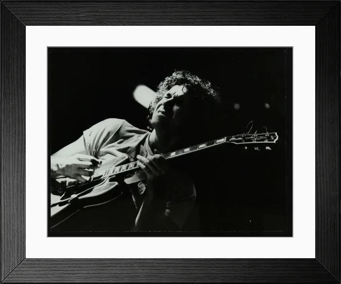 Framed Print : Guitarist John Etheridge playing at The Stables, Wavendon, Buckinghamshire. Artist Framed Print : Guitarist John Etheridge playing at The Stables, Wavendon, Buckinghamshire. Artist