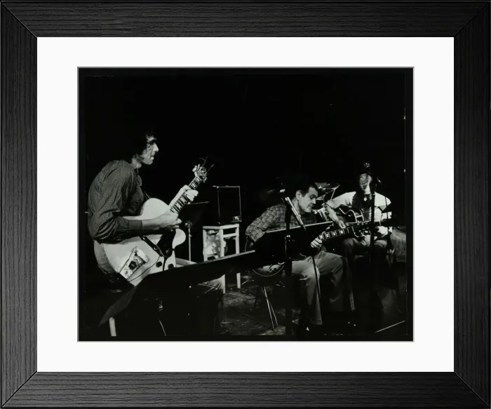 Framed Print : Guitarists John Etheridge and Ike Isaacs performing at The Stables, Wavendon, Buckinghamshire Framed Print : Guitarists John Etheridge and Ike Isaacs performing at The Stables, Wavendon, Buckinghamshire