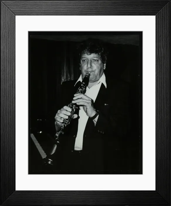 Framed Print : Clarinetist John Denman playing at the Bass Clef, London, 1985. Artist: Denis Williams