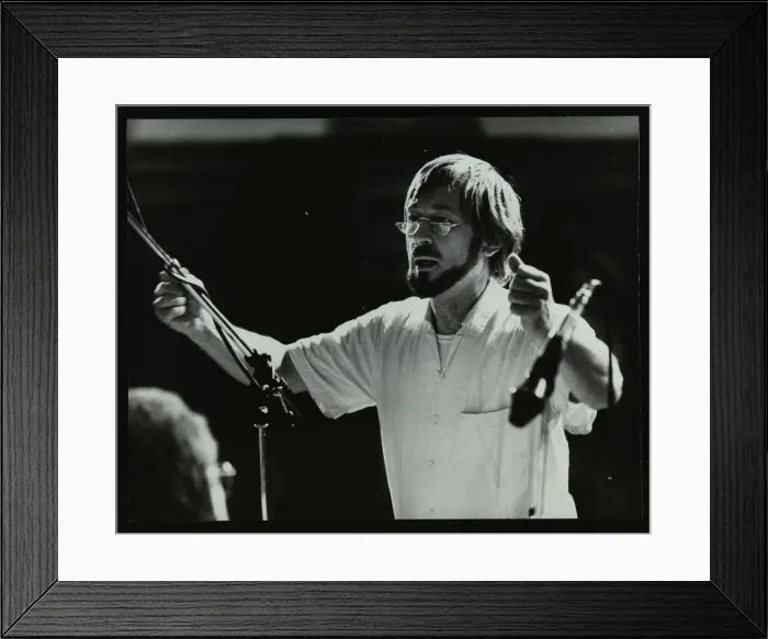 Framed Print : Michael Garrick conducting an orchestra at Berkhamsted Civic Centre, 1985. Artist Framed Print : Michael Garrick conducting an orchestra at Berkhamsted Civic Centre, 1985. Artist