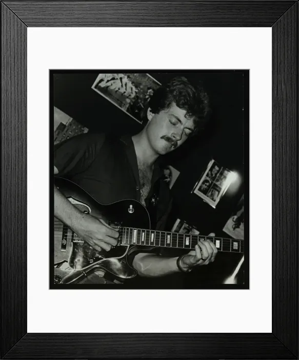Framed Print : Guitarist Martin Taylor playing at the Middlesex and Herts Country Club, Harrow Weald, London, 1981 Framed Print : Guitarist Martin Taylor playing at the Middlesex and Herts Country Club, Harrow Weald, London, 1981
