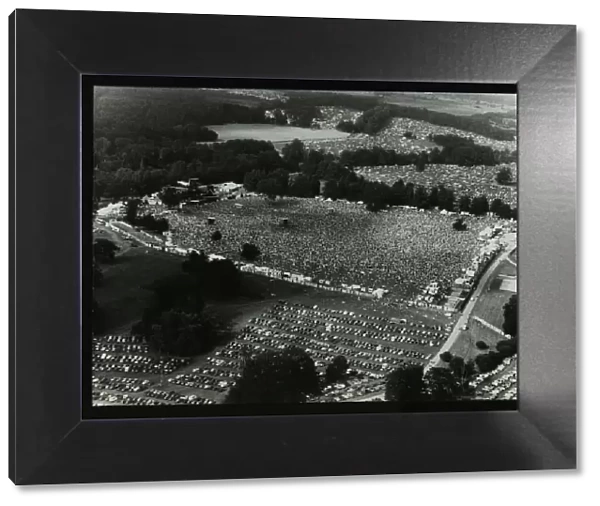 Aerial view of crowds at the Knebworth pop festival, 1986. Artist: Denis Williams