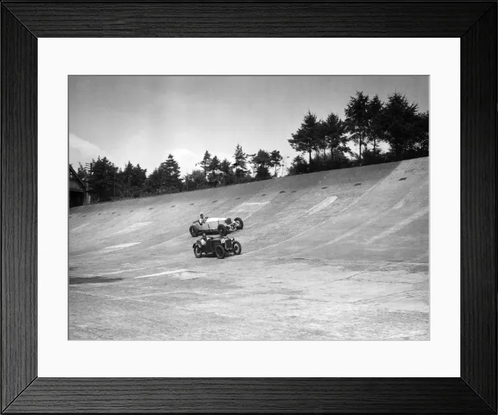 Framed Print : Invicta and Austin Ulster racing on the Members Banking at Brooklands. Artist: Bill Brunell Framed Print : Invicta and Austin Ulster racing on the Members Banking at Brooklands. Artist: Bill Brunell