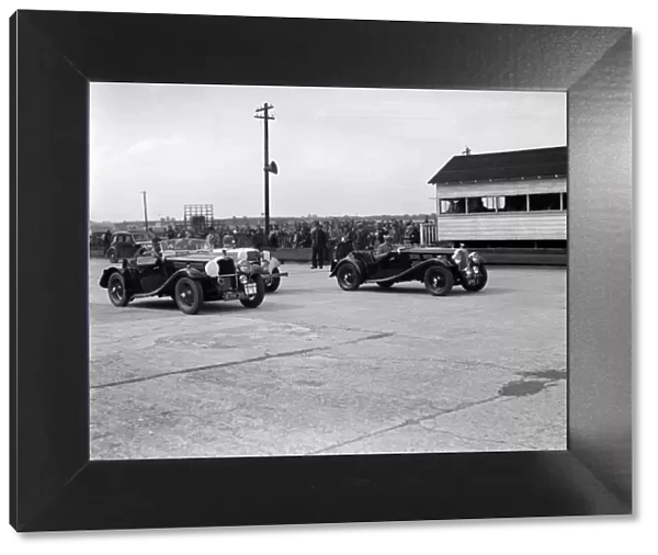 Triumph and Alvis cars at the MCC Members Meeting, Brooklands, 10 September 1938