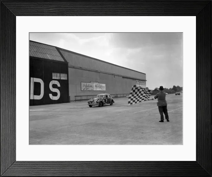 Framed Print : HJ Ripleys SS Jaguar taking the chequered flag, MCC Members Meeting, Brooklands Framed Print : HJ Ripleys SS Jaguar taking the chequered flag, MCC Members Meeting, Brooklands