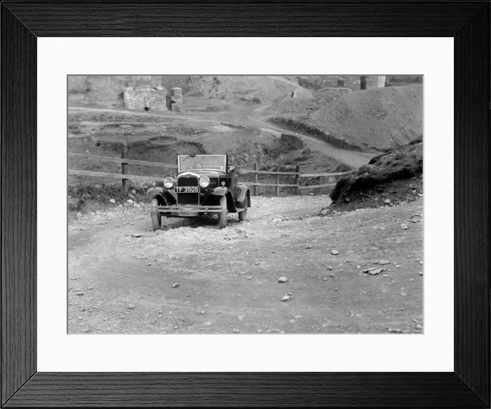Framed Print : Kitty Brunell driving a 1930 Ford Model A 2-seater, 1931. Artist: Bill Brunell Framed Print : Kitty Brunell driving a 1930 Ford Model A 2-seater, 1931. Artist: Bill Brunell