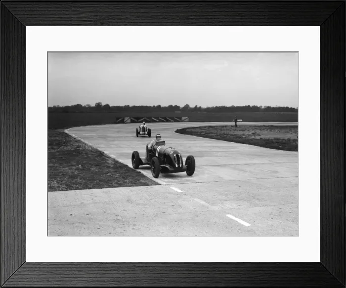 Framed Print : Rapier Special Racing single seater leading a MG in a race on the Campbell Circuit at Brooklands Framed Print : Rapier Special Racing single seater leading a MG in a race on the Campbell Circuit at Brooklands