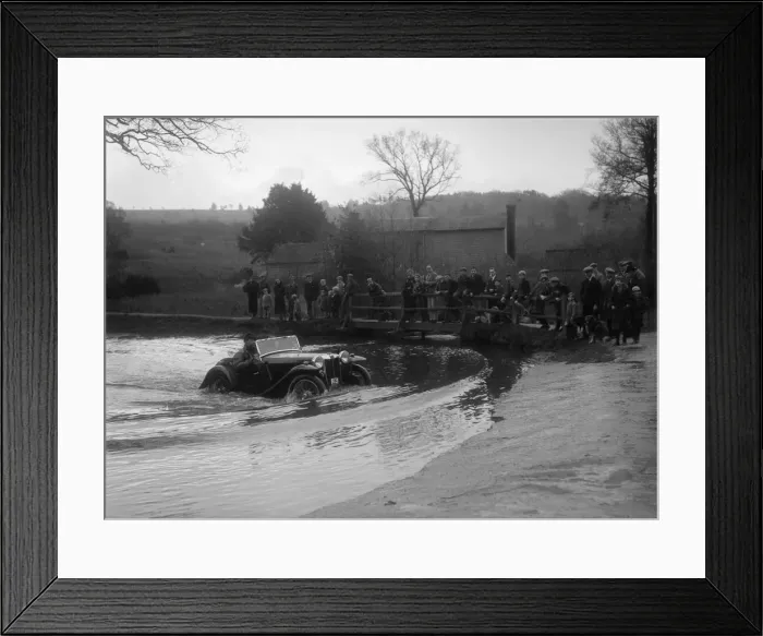Framed Print : MG PA driving through a ford during a motoring trial, 1936. Artist: Bill Brunell Framed Print : MG PA driving through a ford during a motoring trial, 1936. Artist: Bill Brunell