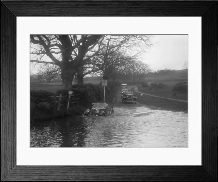 Framed Print : 972 cc Singer Le Mans driving through water during a motoring trial, 1936. Artist: Bill Brunell Framed Print : 972 cc Singer Le Mans driving through water during a motoring trial, 1936. Artist: Bill Brunell