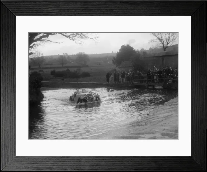 Framed Print : 972 cc Singer Le Mans driving through a ford during a motoring trial, 1936. Artist: Bill Brunell Framed Print : 972 cc Singer Le Mans driving through a ford during a motoring trial, 1936. Artist: Bill Brunell